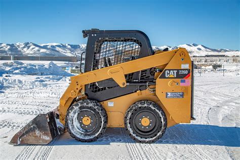 wheeled skid steer tipping load